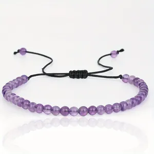 Detail view of 4mm purple amethyst beads on an adjustable woven bracelet cord