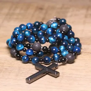 Close-up of blue tiger eye and hematite cross rosary necklace for men