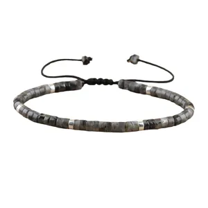 Adjustable natural stone beaded bracelet with spacer beads and black cord tie