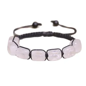 Bracciale chakra in cristallo naturale intrecciato a mano con cordino nero regolabile.