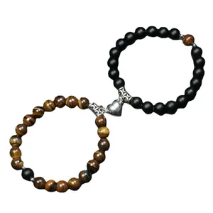 Set braccialetti con perline e cuore magnetico, occhio di tigre e pietre nere