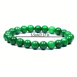 Detailed view of 8mm green healing stone beaded bracelet with 5.5cm inner diameter