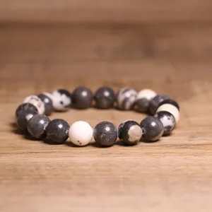Close-up of 8mm natural Indian agate beaded bracelet with black and white marbling