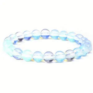 Detailed view of 8mm iridescent blue glow healing stone beads on elastic bracelet
