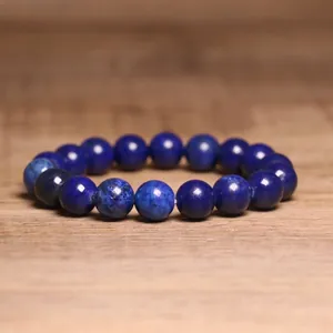 Detailed macro view showing the texture of 8mm blue natural stone beaded bracelet