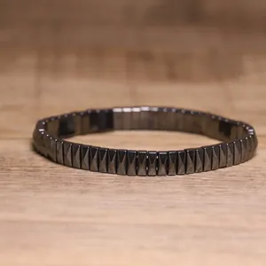 Detailed macro view showing the unique textured pyramid beads of this hematite bracelet