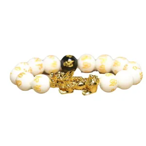 Bracelet traditionnel de richesse avec breloque Pixiu dorée et perles de mantra