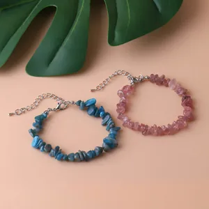Detailed view of natural irregular stone chip charm bracelets with lobster clasp
