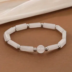 Elegant natural white crystal gemstone bracelet with silver spacer beads detail