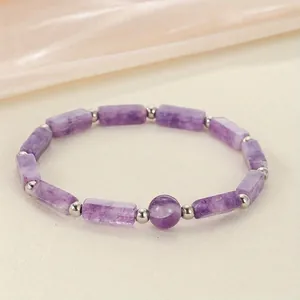 Detailed view of natural amethyst gemstone bracelet with rectangular and round beads.