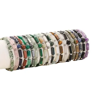 Collection of natural gemstone beaded energy bracelets for women on display stand