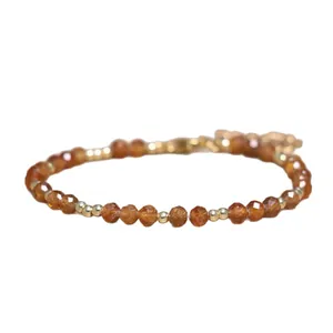 Bracelet fait main en pierre naturelle marron facettée avec chaîne dorée ajustable