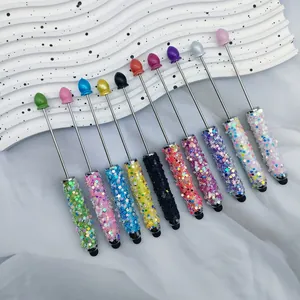 Detailed close-up view of a set of colorful star glitter stylus pens with soft touch tips.
