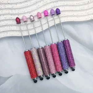 Close-up of sparkling rhinestone dual-purpose touch screen pens in various colors