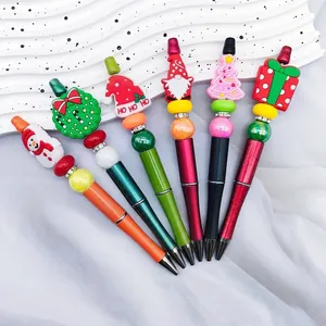 Set of six festive Christmas beaded pens with assorted cute holiday-themed toppers.
