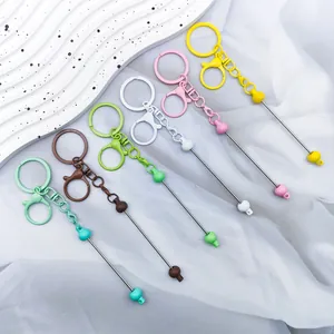 Collection of colorful painted lobster clasp beadable keychain rods for DIY crafts