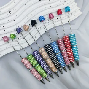 Set of multicolor DIY rhinestone beaded ballpoint pens with spiral sparkling patterns