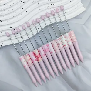 Juego de 12 bolígrafos de cuentas rosa DIY con lindos lazos y corazones para papelería.