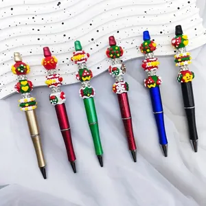 Handmade Christmas theme beaded ballpoint pens with festive snowflake and tree charms