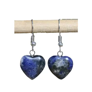 Minimalist natural blue stone heart dangle earrings for women on a white background.