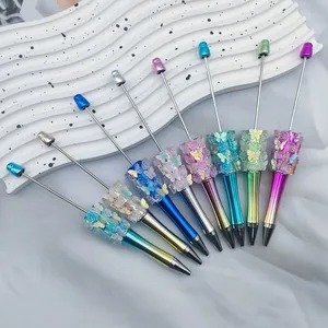 Set van 8 creatieve balpennen met vlinder- en rooskralen en gegalvaniseerde behuizing