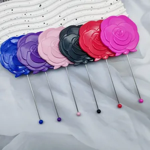 Multiple colorful rose-shaped handheld mirrors with slim metal handles for DIY beauty