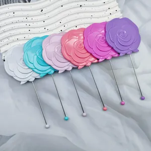 Collection of six colorful rose-shaped handheld mirrors featuring slim handles and matching beads