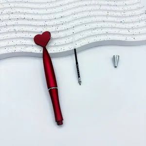 Red heart-shaped twist ballpoint pen set, ideal for Valentine's Day gift-giving.