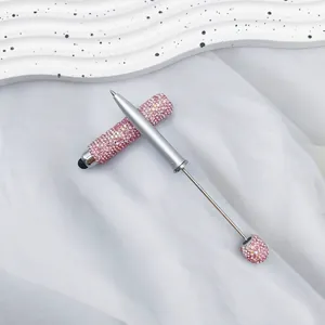 Close-up detail of luxury pink rhinestone beadable stylus pen for DIY jewelry crafting