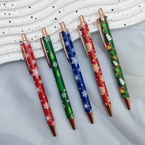Christmas printed ballpoint pen set with metal push-button and festive patterns.