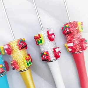 Christmas themed DIY beaded ballpoint pens with sparkling snowflake sugar texture