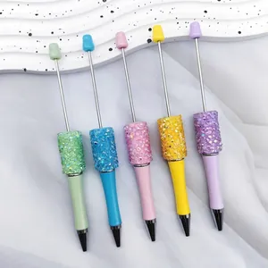 DIY pastel beaded ballpoint pens with sparkly AB rhinestone grips and metal shafts