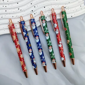 Set of 6 Christmas themed ballpoint pens with Santa and snowman patterns