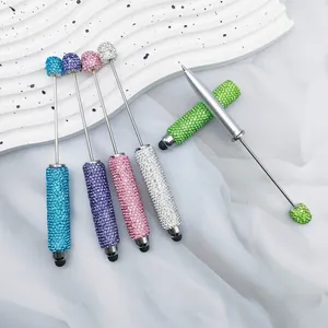 Multi-functional DIY beadable stylus pen with full rhinestone decoration in assorted colors.