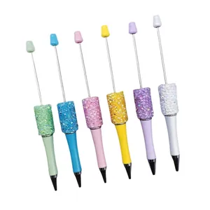 Set of DIY colorful rhinestone beaded pens with transparent resin finish