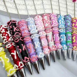 Vibrant creative ballpoint pens with textured hand-painted cream glue relief design