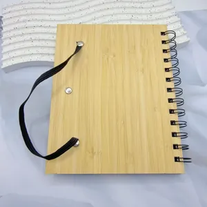Natural bamboo cover spiral notebook 14x18cm with black elastic band closure detail