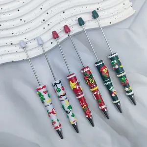 Set di 6 penne a sfera con perline a tema natalizio e decorazioni in crema gel