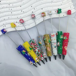Bolígrafos de Navidad hechos a mano con cuentas y dijes de Papá Noel y Muñeco de nieve
