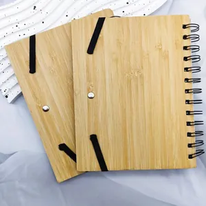 Detailed view of eco-friendly bamboo wood cover notebook with black spiral binding
