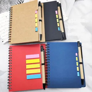Set of colorful spiral notebooks with matching eco-friendly pens and sticky notes