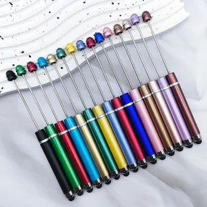 Detailed view of colorful beadable stylus pens arranged in a row on white background
