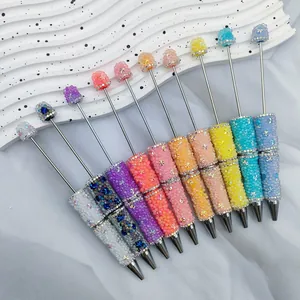 Set of vibrant rainbow rhinestone beaded ballpoint pens with colorful bubble beads
