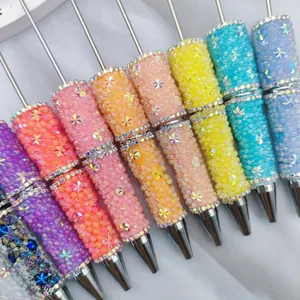 Colorful beaded rhinestone ballpoint pens with mermaid bubble beads and star accents.