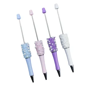 Elegant sugar pearl beaded ballpoint pens with rhinestones in four pastel colors.