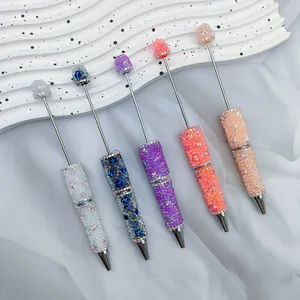 Set of five colorful DIY beaded ballpoint pens with sparkly rhinestones and mermaid bubble beads