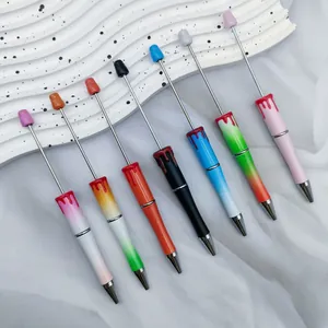 Set of 7 Halloween-themed beaded ballpoint pens with unique red blood drip design