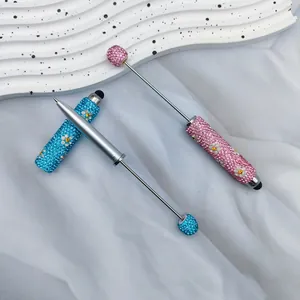 Sparkling daisy rhinestone beaded pen with integrated touch screen stylus functionality