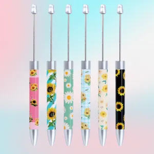 Juego de seis bolígrafos con cuentas y patrón de girasol con varillas metálicas DIY