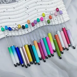 Colorful DIY beaded stylus pens with gradient metal handles for touchscreen devices.